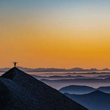 Man on Mountain Peak